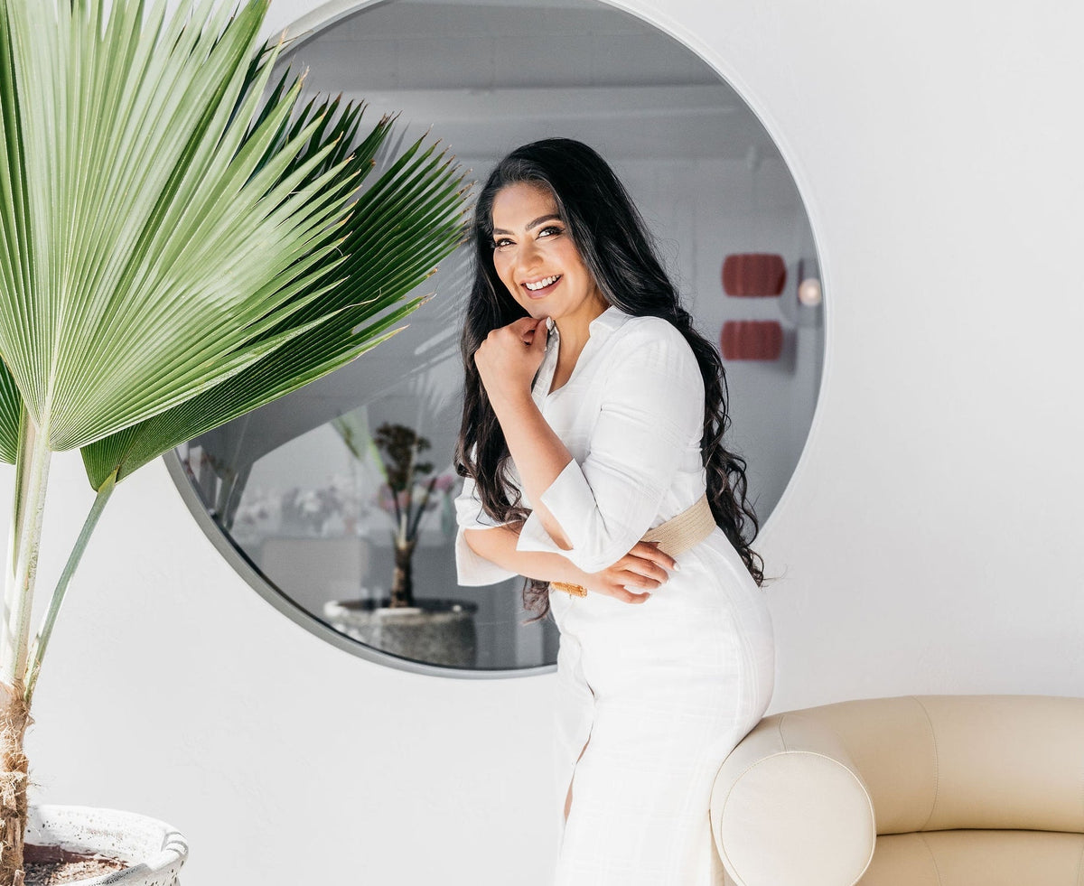 Dr Tanya Standing in Front of a Mirror Posing