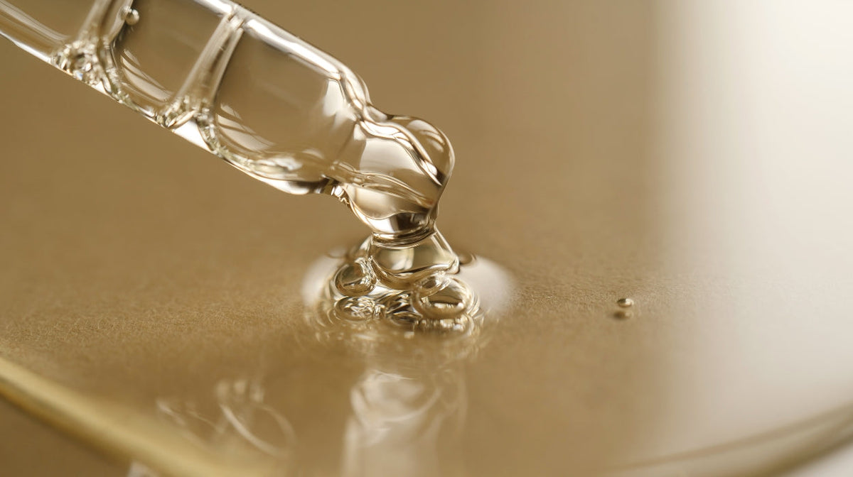 Close up of a hyaluronic acid serum dropper