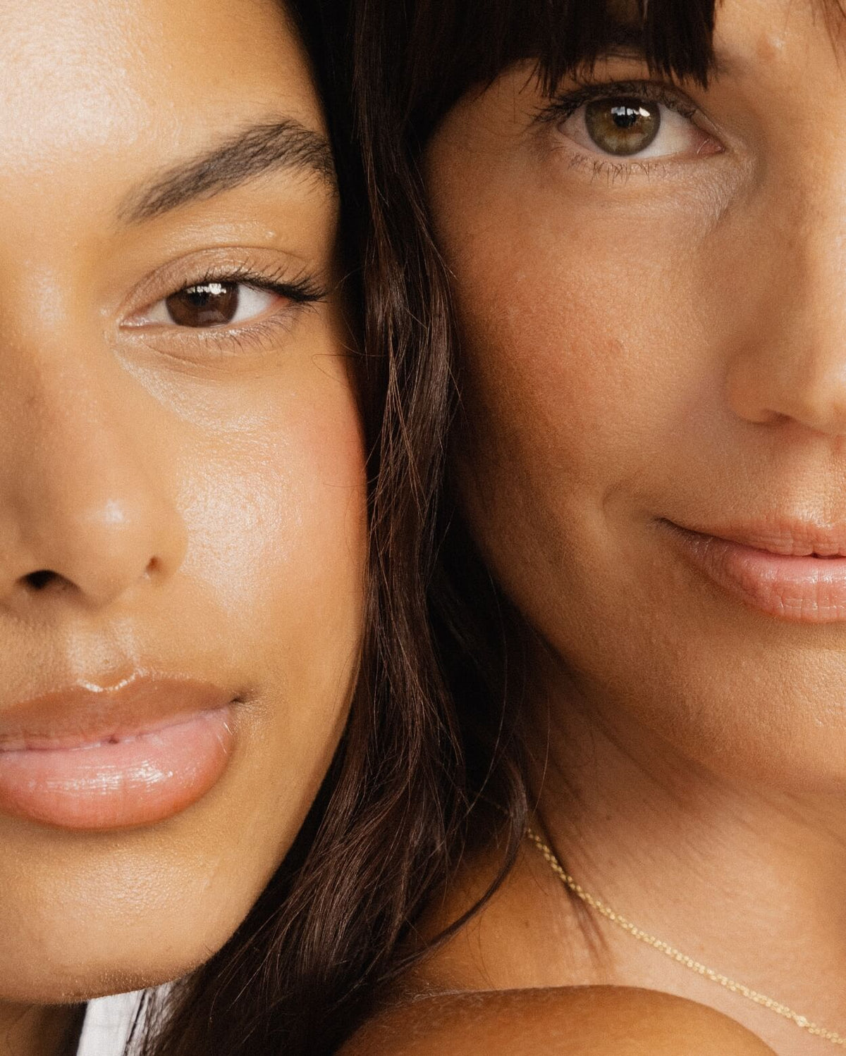 A close up photo of two ladies skin