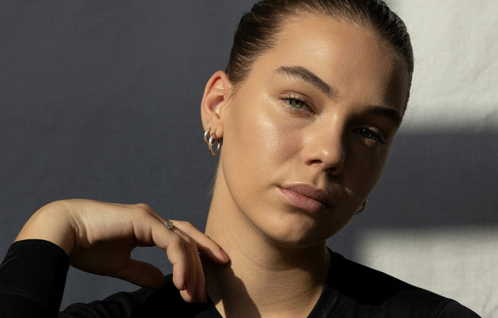 A close up photo of a lady's face