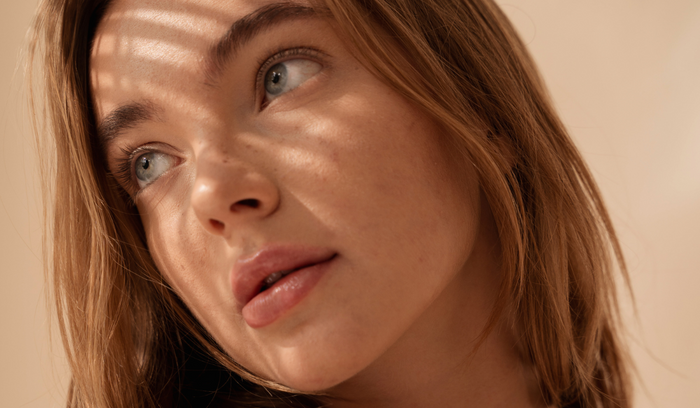 A lady starting into the distance